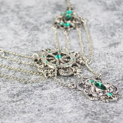 Steampunk necklace with green crystals