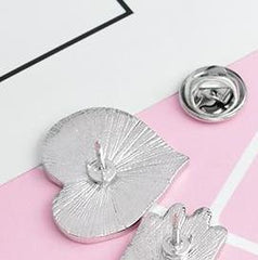 'We Are The Weirdos' Black Heart Shaped Pin